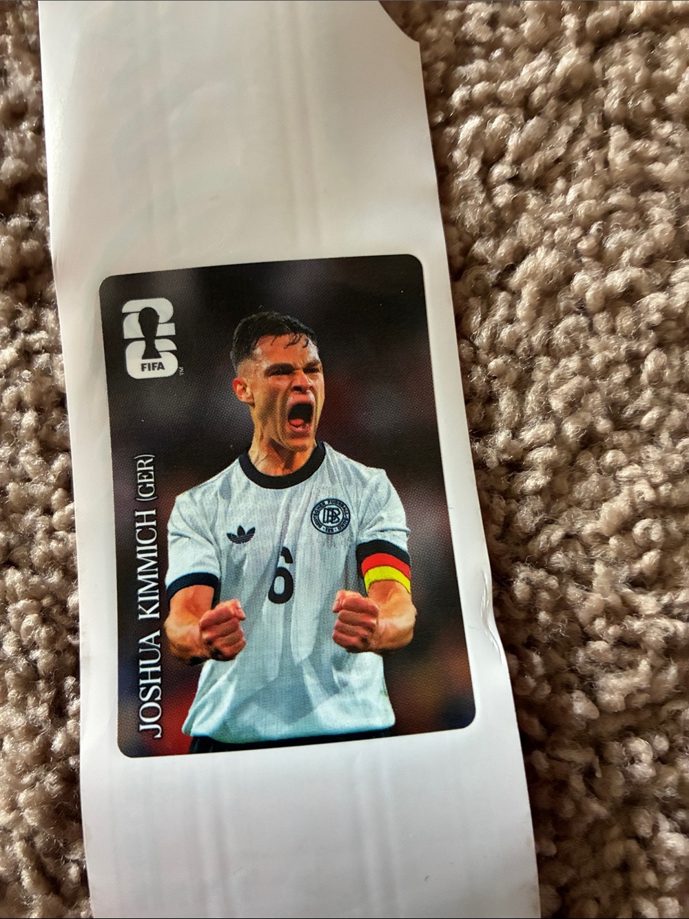 Coca Cola Soccer Player Card with Red, Black, White and Yellow Accents